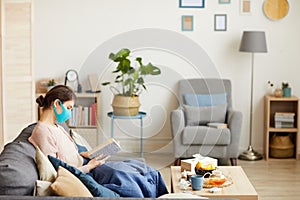 Woman sitting on quarantine at home photo