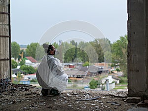 Young woman in protective safety mask and clothing