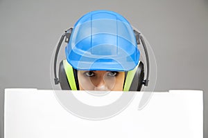 Young woman in protective workwear