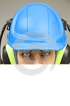 Young woman in protective workwear