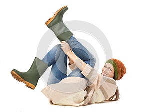 Young Woman Putting on Gardening Boots