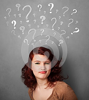 Young woman with question marks above her head