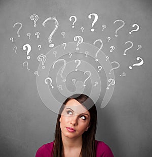 Young woman with question marks above her head