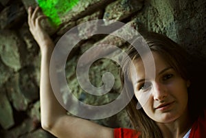 Young woman raising arm