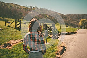 Young woman on a ranch photo