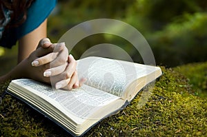 Young woman reading bible