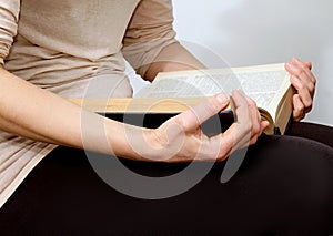 Young woman reading a bible in peace and quiet stock photo