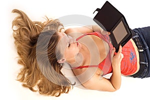 Young woman reading electronic book