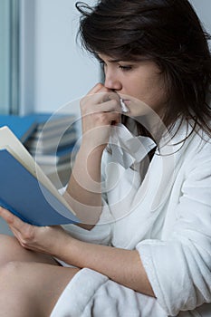 Young woman reading romance