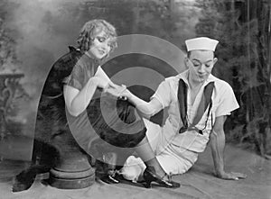 Young woman reading sailors palm photo