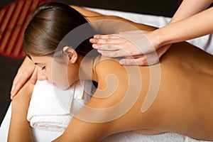 Young woman receiving a massage