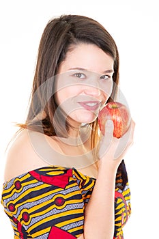 Young woman with red apple looks left