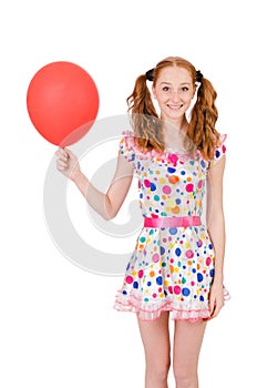 Young woman with red balloon isolated