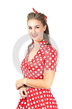 Young woman in red dotted dress