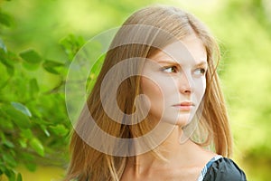 Young woman reflects photo