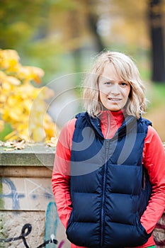 Young woman relaxing in autumn park