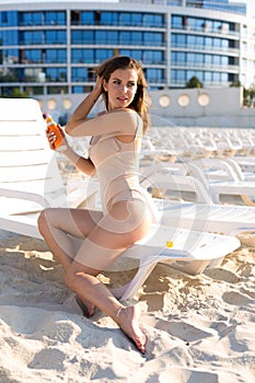 Young woman relaxing at the beach resort