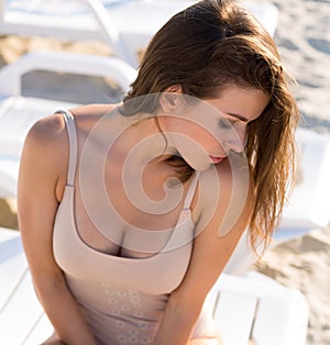 Young woman relaxing at the beach resort