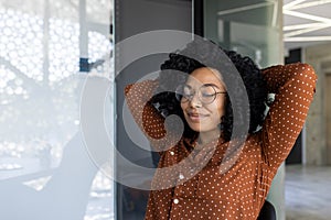 Young woman relaxing at a modern office during a break