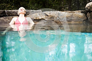 Young Woman Relaxing in a Nordic Spa