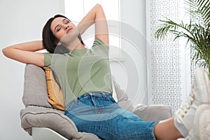 Young woman relaxing . Peaceful rest