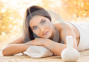 Young woman relaxing on a spa massage procedure