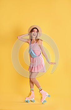 Young woman with retro roller skates
