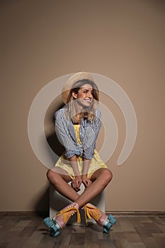 Young woman with retro roller skates