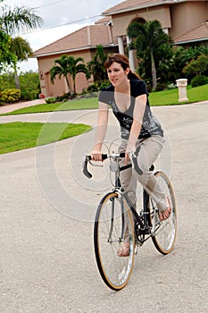 Young woman riding a bike