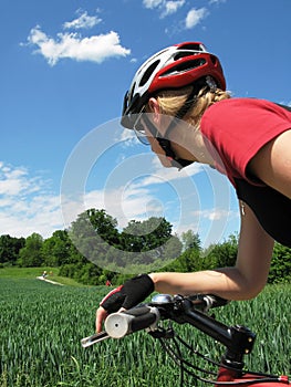 Young woman riding a bike