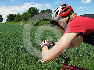 Young woman riding a bike