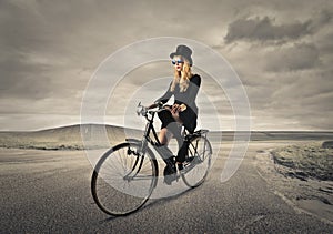 Young woman riding a bike