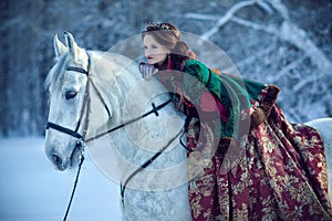 Young woman riding a horse