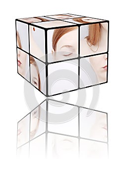 Young woman in a Rubic's cube