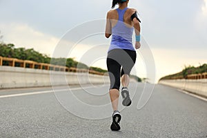 Young woman runner running