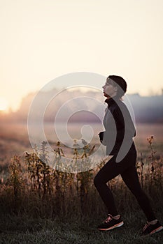 Young woman running in the morning