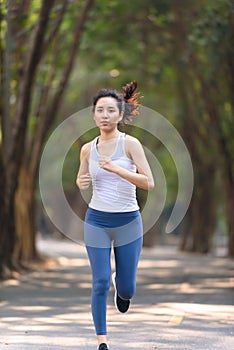 Young woman running in a park