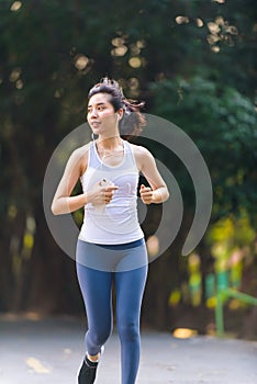 Young woman running in a park