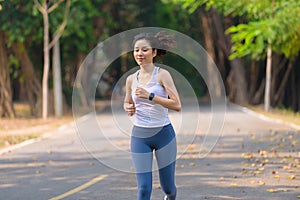 Young woman running in a park