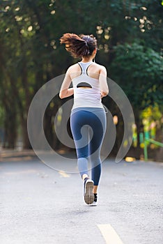 Young woman running in a park