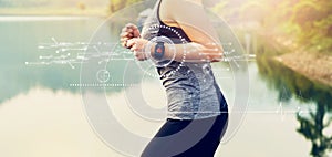 Young woman running and technology healthcare wellness with the screen icon innovation and sports watch, performance of body. photo