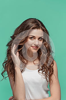 The young woman`s portrait with happy emotions