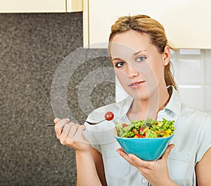 Young woman with salad