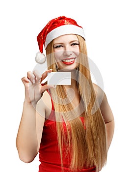 Young woman in santa claus hat with christmas invitation card