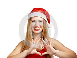 Young woman in santa hat with heart shape