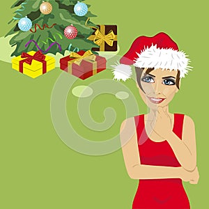Young woman in santa hat looking up thinking about gifts under christmas tree