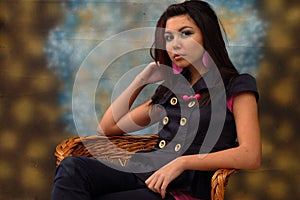 Young woman sat in chair