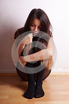 Young woman with scars from self-harm photo