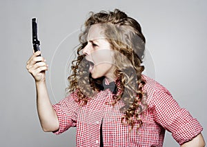 Young woman screaming on the phone