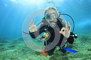 Young woman scuba diving